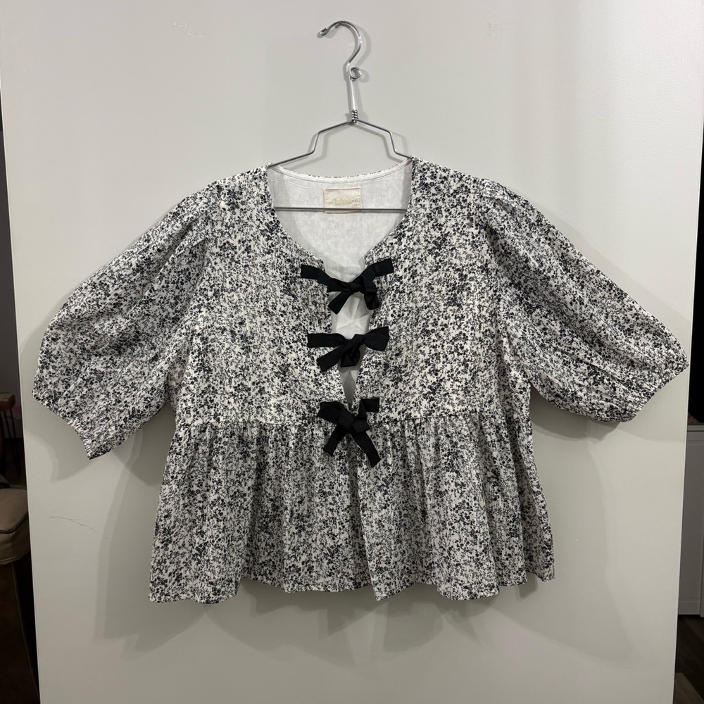 NWOT Boutique Black & White Floral Peplum Blouse with Bow Ties